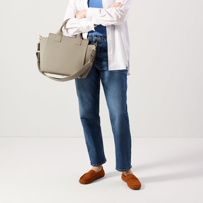 The Handbag in Coastal Mini Check shown on model in a different pose. 
