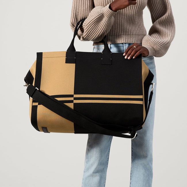 The Weekender in Camel and Black shown on model.