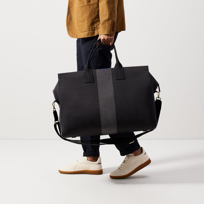 An alternate view of The Weekender in Shadow Black on a model.