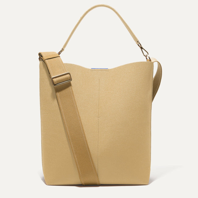 The Bucket Bag in Golden Wheat shown from the front. 