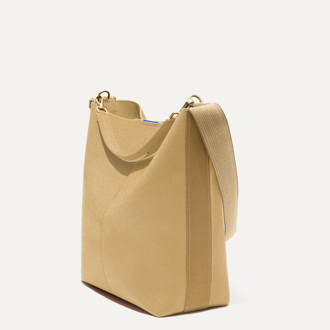 The Bucket Bag in Golden Wheat shown in a diagonal view.