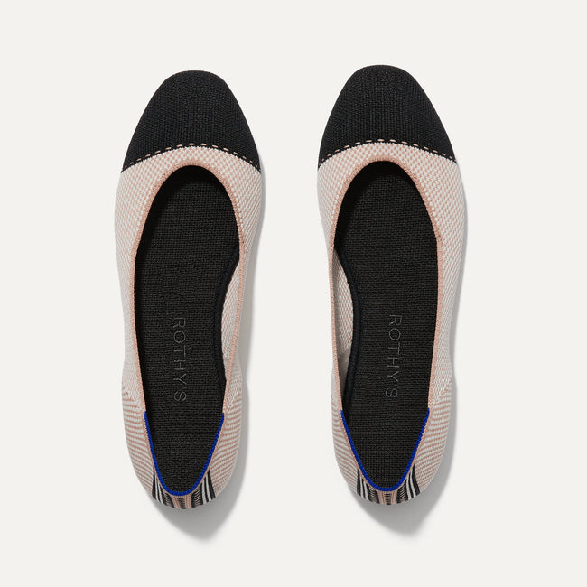 A pair of The Square toe flat shoe in Tuxedo shown from the top view.
