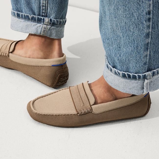 hover | Model wearing The Driving Loafer in Canyon Brown.