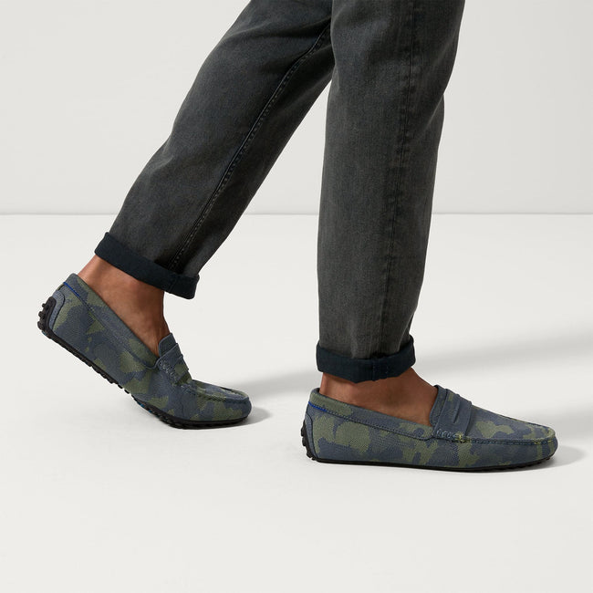 Model wearing The Driving Loafer in Forest Camo. 