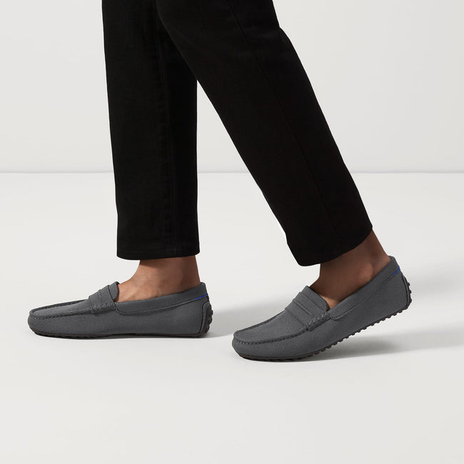 hover | Model wearing The Driving Loafer in Graphite Grey.