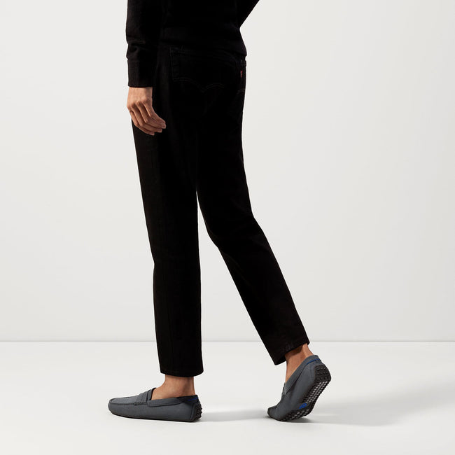 Alternate view of a model wearing The Driving Loafer in Graphite Grey. 