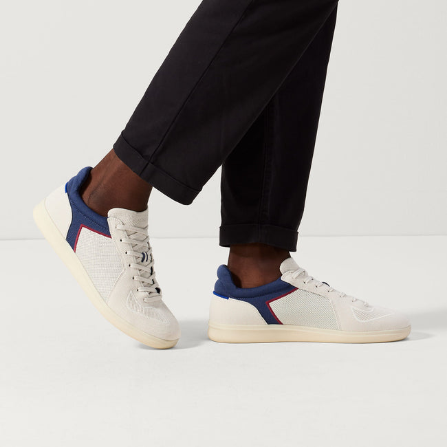 hover | Model wearing The RS01 Sneaker in Blue Jay. 