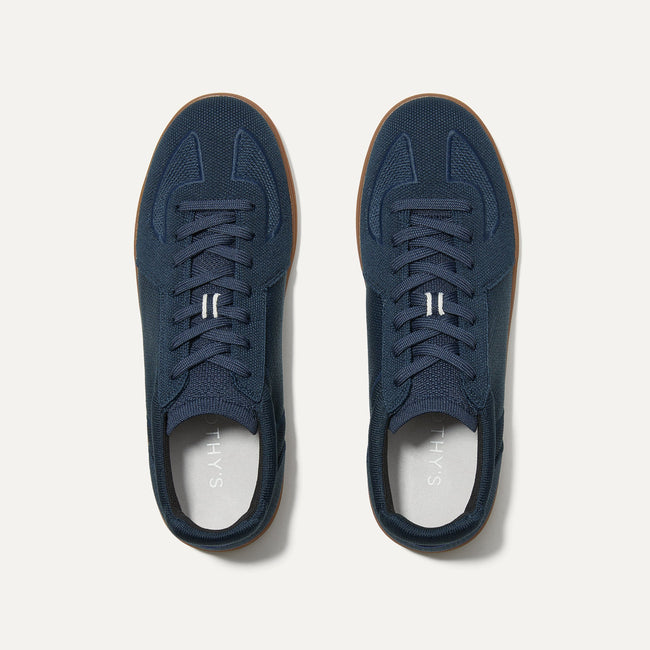 A pair of The RS01 Sneaker in Navy shown from the top. 