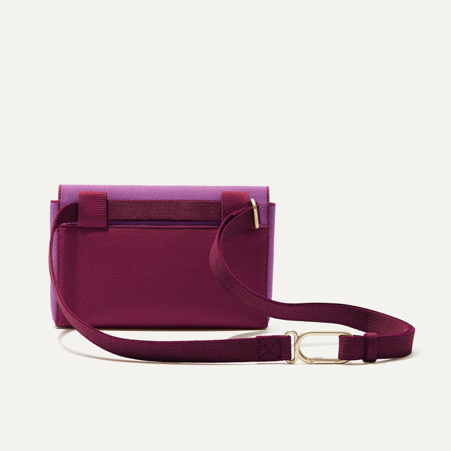 The Belt Bag in Plum Berry shown from the back. 