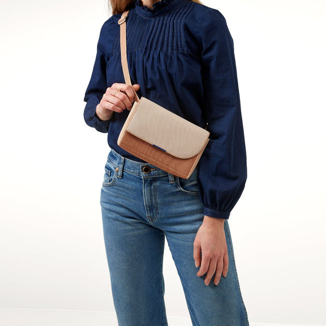 Model wearing The Belt Bag in Biscotti Brown.