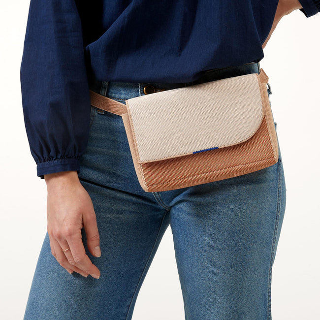 Another view of model wearing The Belt Bag in Biscotti Brown.