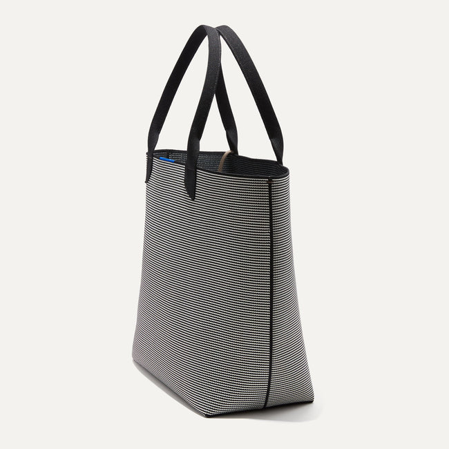 The Lightweight Tote in Black & White Stripe shown in diagonal view. 