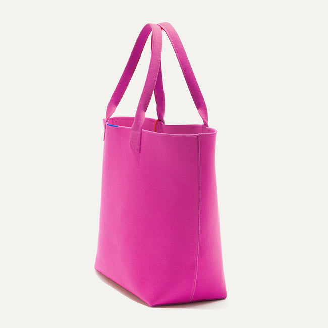 The Lightweight Tote in Dragon Fruit shown in diagonal view. 