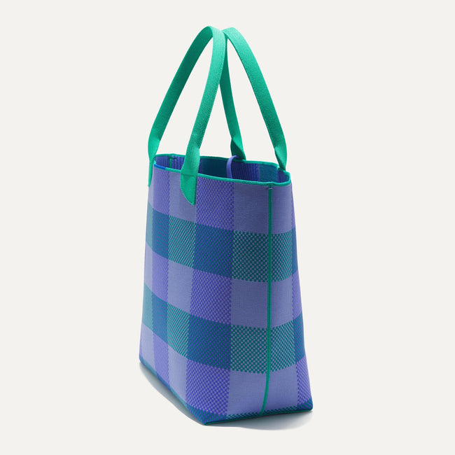 The Lightweight Tote in Blueberry Gingham shown in diagonal view. 