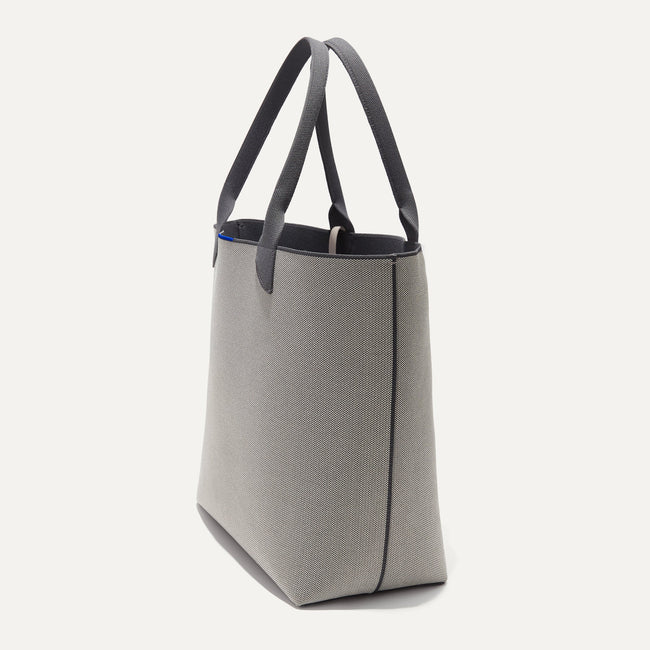 The Lightweight Tote in Iron Grey shown in diagonal view. 