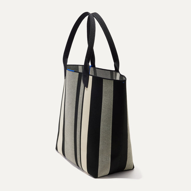 The Lightweight Tote in Ivory Rugby Stripe shown in diagonal view. 