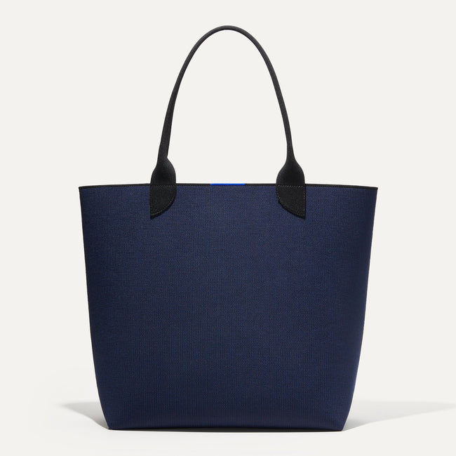 The Lightweight Tote in Sapphire and Onyx shown from the front.