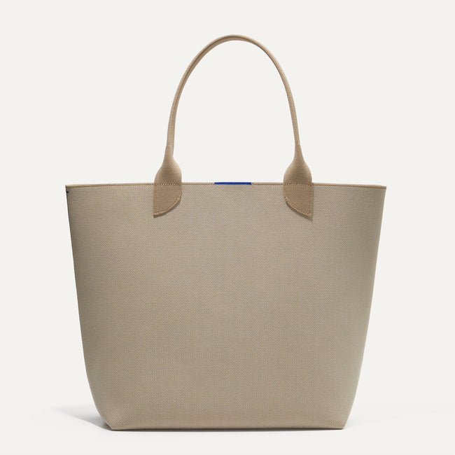 The Lightweight Tote in Soft Sesame shown from the front. 
