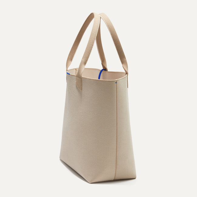 The Lightweight Tote in Soft Sesame shown in diagonal view. 