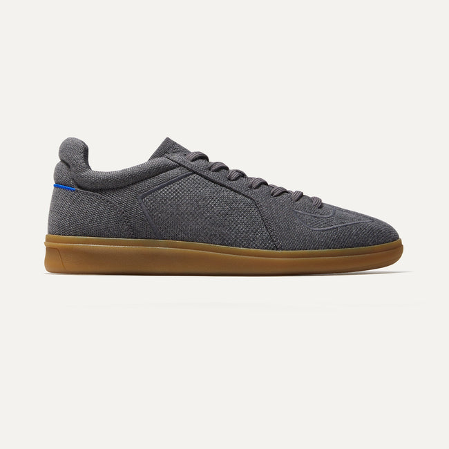 The Merino RS01 Sneaker in Mountain Grey shown from the side. 