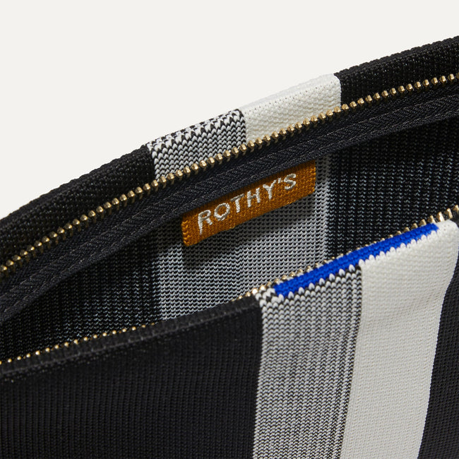 The Wristlet in Black Mist interior view with Rothy's halo detail.