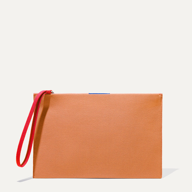 The Wristlet in Clementine shown from the front. 