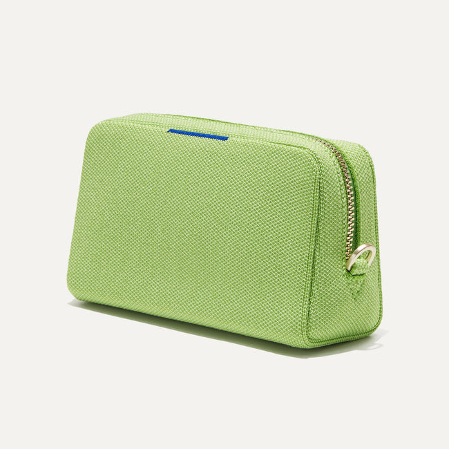 The Mini Universal Pouch in Bright Palm shown at a diagonal view from the right.