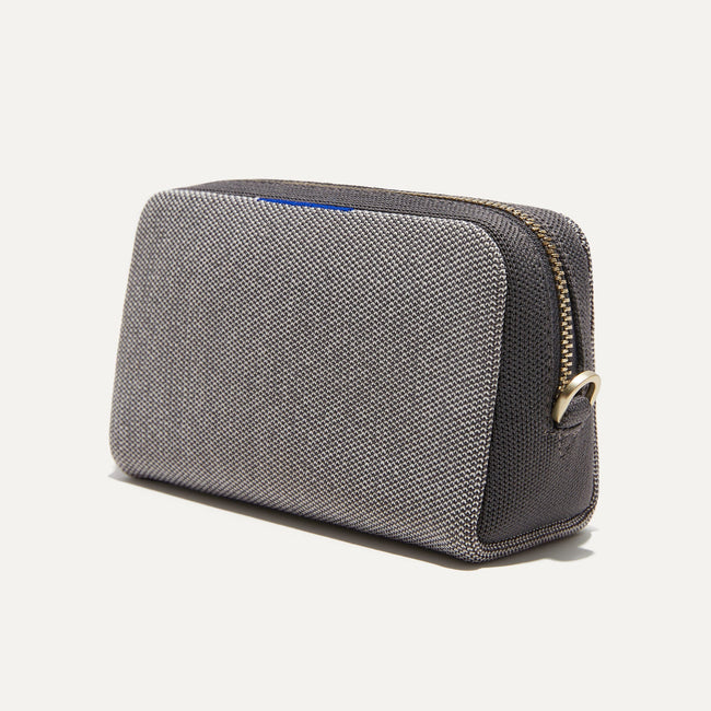 The Mini Universal Pouch in Iron Grey shown at a diagonal view from the right.