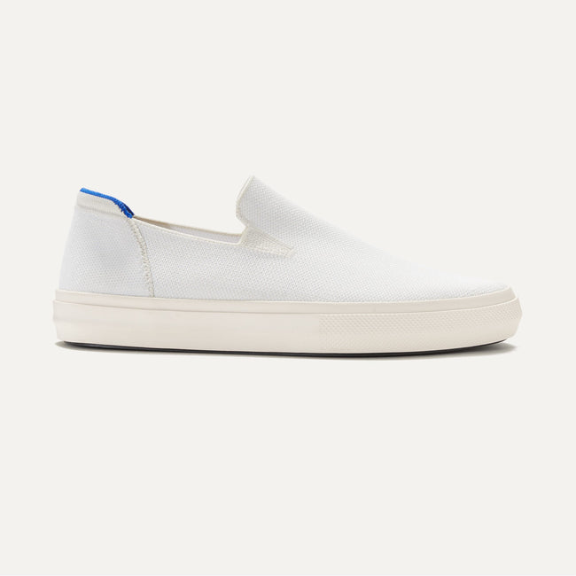 The City Slip On Sneaker in White shown from the side.