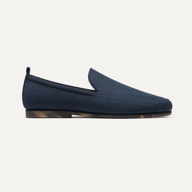 The Ravello Loafer in Navy shown from the side.