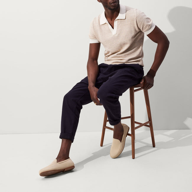 Alternate view of a model wearing The Ravello Loafer in Sand.