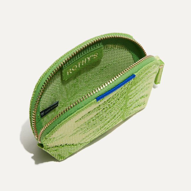 The Demi Pouch in Palm Leaf shown open from the top. 
