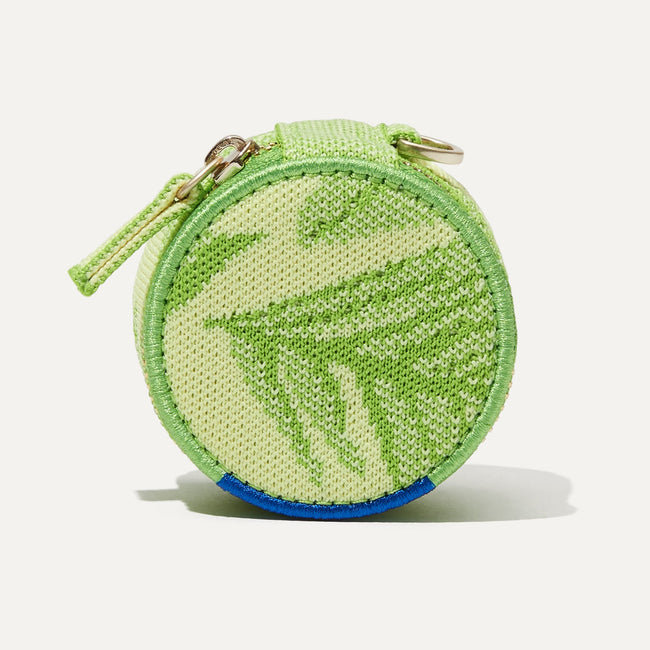 The Round Pouch in Palm Leaf shown from the front.
