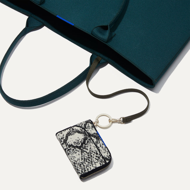 The Wallet Keychain in Python shown attached to keyleash of The Lightweight Tote.