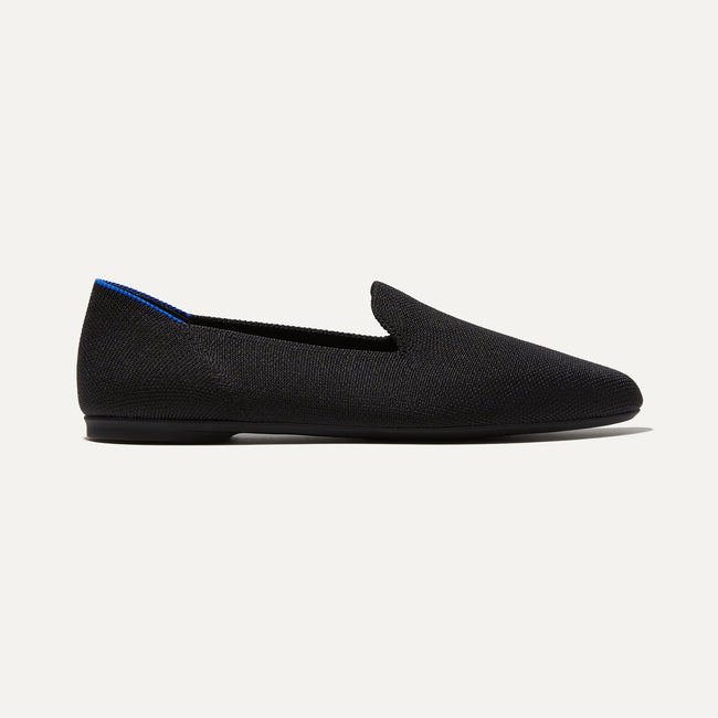 The Almond Loafer in Black shown from the side. 