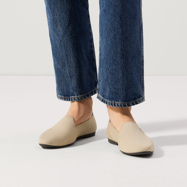 Model wearing The Almond Loafer in Chai Twill. 