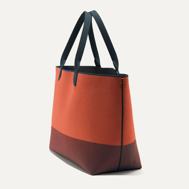 The Lightweight Mega Tote in Indigo Spice Twill, shown from the side.