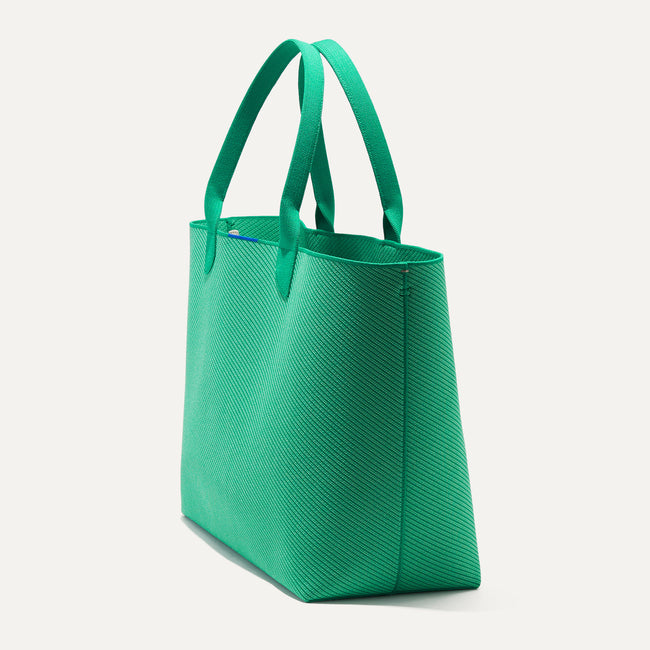 The Lightweight Mega Tote in Sea Green Twill, shown from the side.