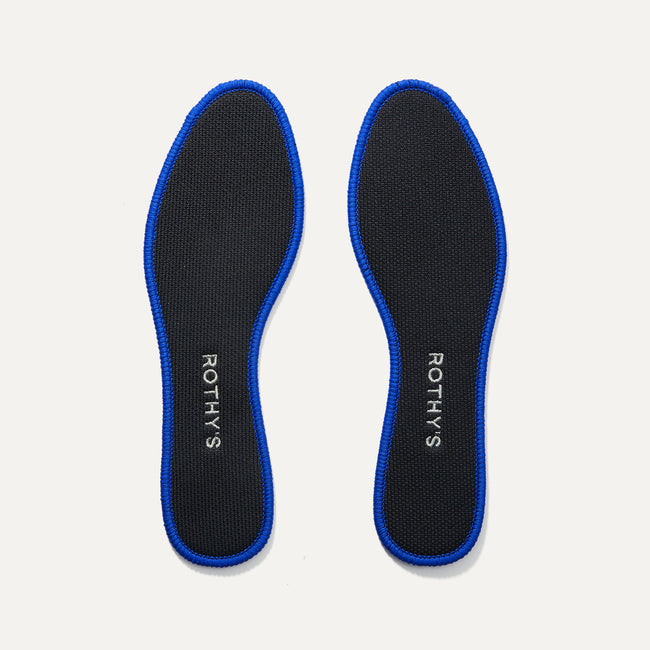 The Flat/Loafer insole in Black shown in a top view.